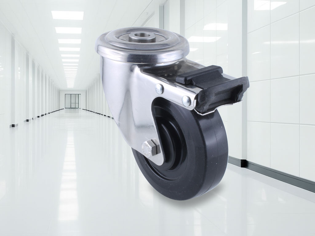 Hygienic castor with black rubber wheel, bolt hole